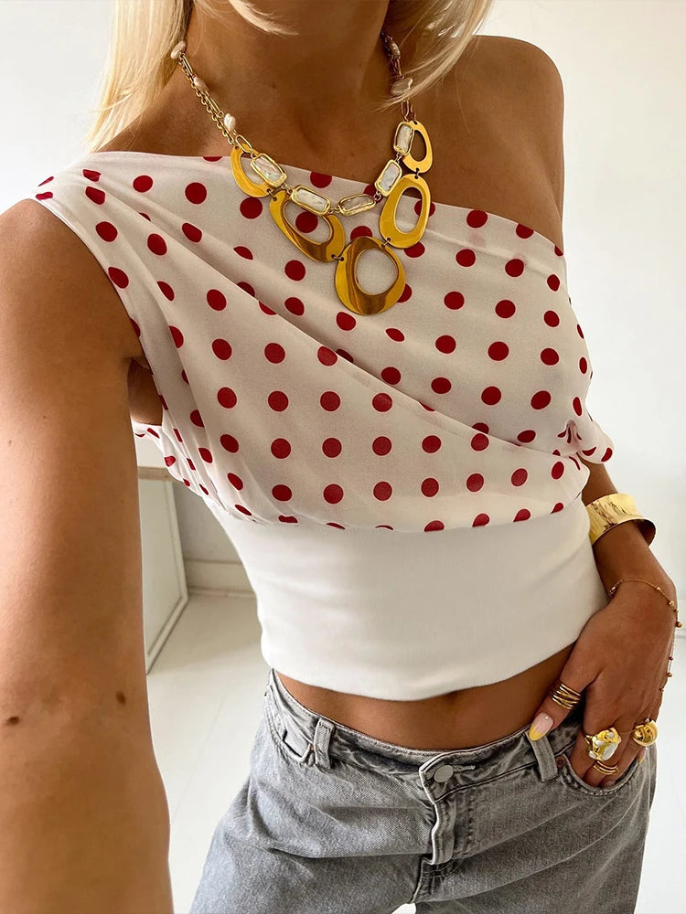 Top off-shoulder de lunares con cintura ajustada