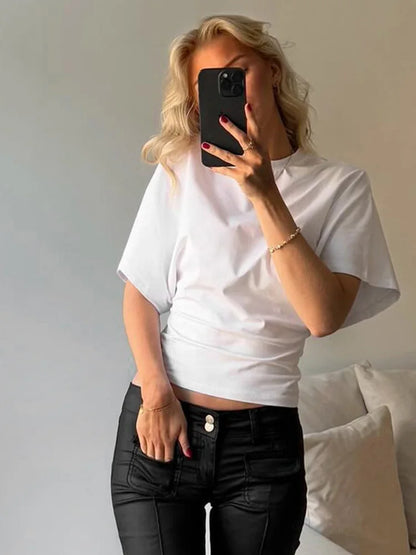 Top holgado con cintura ajustada