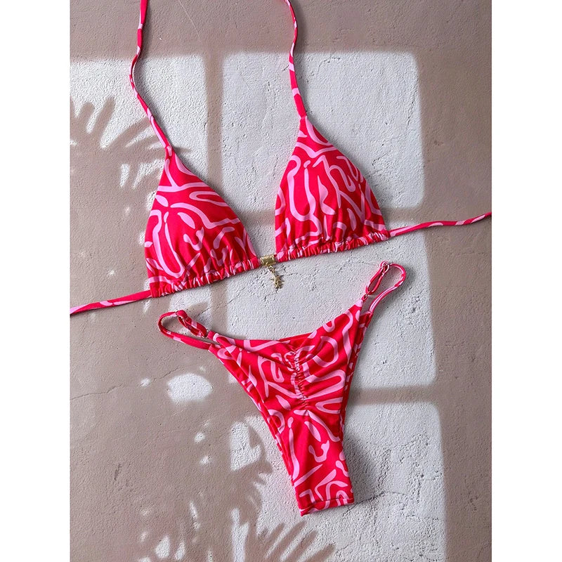 Bikini triangular estampado con charm